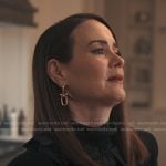 Carr’s gold link drop earrings on Alls Fair