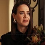 Carr’s silver drop earrings on Alls Fair