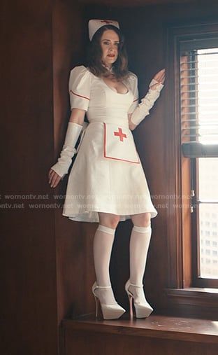 Carr’s white platform pumps on Alls Fair