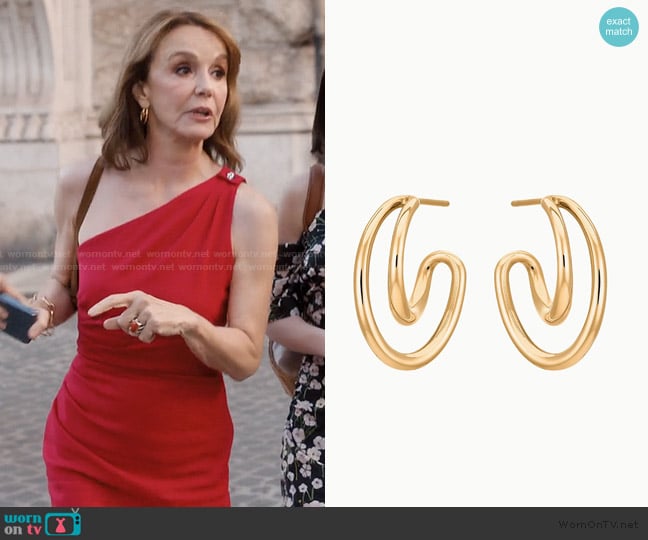 Charlotte Chesnais Mini Initial Hoop Earrings worn by Sylvie (Philippine Leroy-Beaulieu) on Emily in Paris
