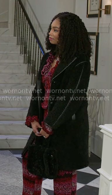 Chelsea's black fleece coat on Beyond the Gates