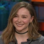 Chloe Grace Moretz’s gray pearl trim cardigan on The Kelly Clarkson Show