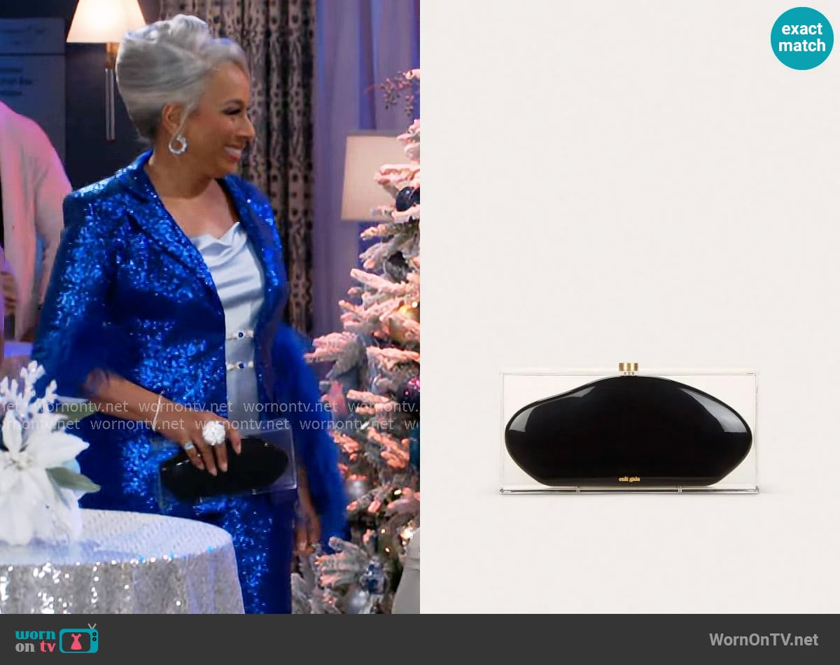 Cult Gaia Annika Clutch worn by Anita Dupree (Tamara Tunie) on Beyond the Gates