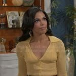 Dani's yellow ribbed polo top and leather skirt on Beyond the Gates