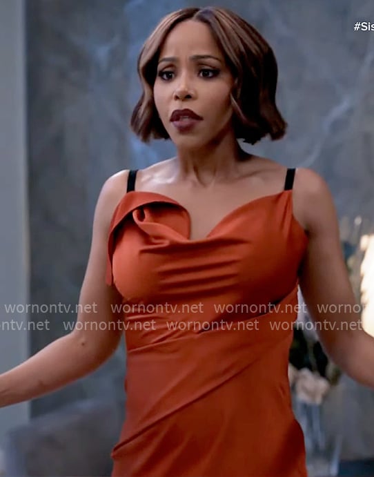 Dani's rust red dress with black straps on Tyler Perrys Sistas