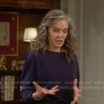 Diane’s navy dolman sleeve sweater and plaid slip skirt on The Young and the Restless