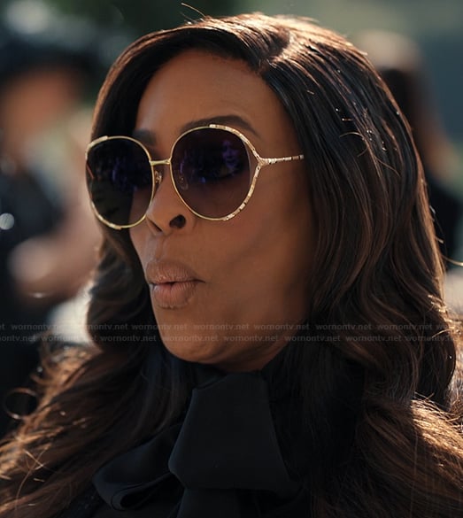 Emerald's round trim sunglasses on Alls Fair