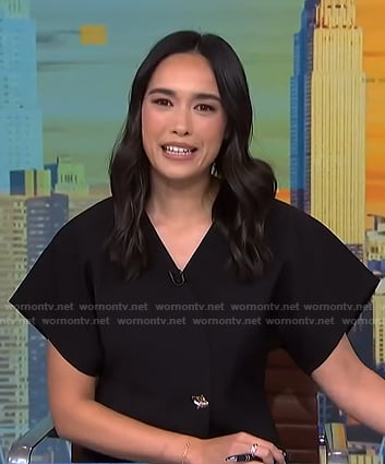 Emilie’s black short sleeve top on NBC News Daily