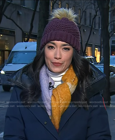 Emilie’s navy down coat and purple knit beanie on Today