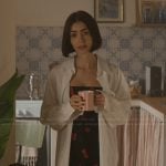 Emily's black cherry print mini dress on Emily in Paris