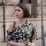 Emily’s floral print asymmetric neckline dress on Emily in Paris