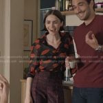 Emily’s blac lip print shirt and pants on Emily in Paris