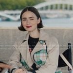 Emily’s plaid trench coat and res check dress on Emily in Paris