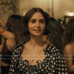 Emily's navy polka dot shirt and shorts on Emily in Paris