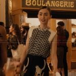 Emily’s printed vest and floral pants on Emily in Paris