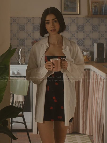 Emily’s black cherry print mini dress on Emily in Paris