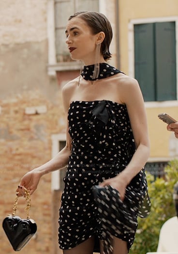 Emily’s black polka dot strapless dress on Emily in Paris