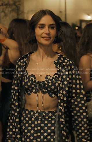 Emily’s navy polka dot shirt and shorts on Emily in Paris