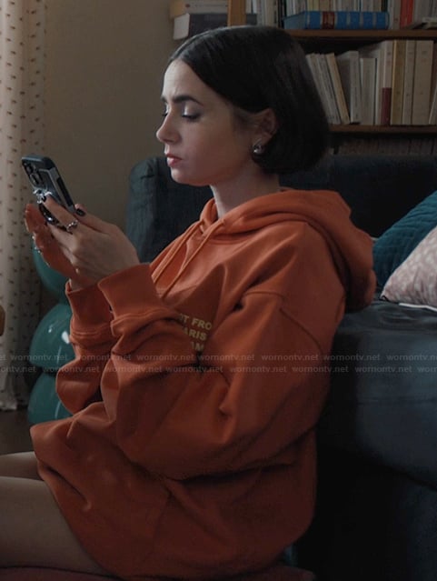 Emily’s orange oversized hoodie on Emily in Paris