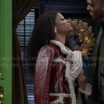 Eva’s leather coat with sherpa trims on Beyond the Gates