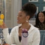 Eva’s white knit jacket on Beyond the Gates