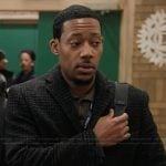 Gregory’s black plaid coat on Abbott Elementary