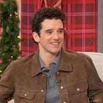 Michael Urie’s brown suede jacket on Sherri
