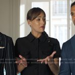 Genevieve’s black short jacket and mini skirt on Emily in Paris