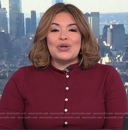 Gilma Avalos's red cardigan on NBC News Daily