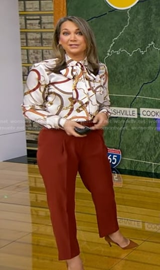 Ginger’s belt print blouse and burgundy pants on Good Morning America