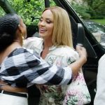 Gizelle’s white floral print shirtdress on The Real Housewives of Potomac