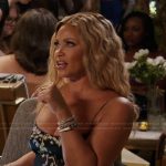 Gizelle’s black floral print top on The Real Housewives of Potomac