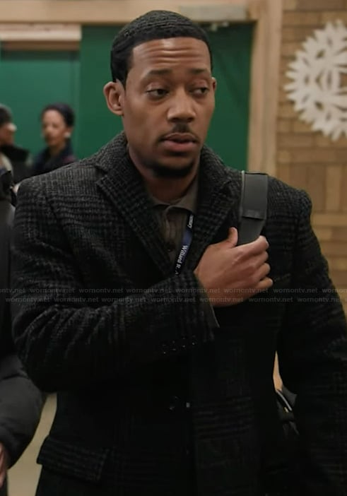 Gregory’s black plaid coat on Abbott Elementary