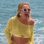 Heahter’s yellow open knit crop top and skirt on The Real Housewives of Salt Lake City