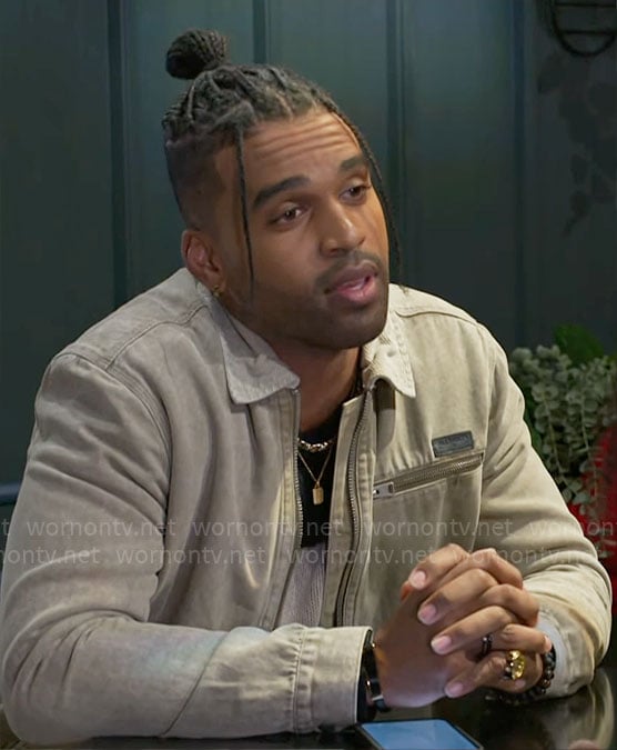 Izaiah’s beige jacket on Beyond the Gates