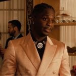 Julien’s pink satin blazer on Emily in Paris