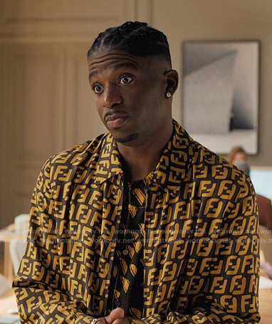 Julien's brown and yellow print shirt and jacket on Emily in Paris