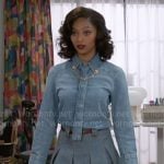 Kat’s denim tie shirt and pleated skirt on Beyond the Gates