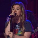 Kelly's black graphic tee on The Kelly Clarkson Show