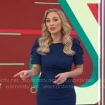 Kelly O’Grady’s dark blue puff-sleeve dress on CBS Mornings