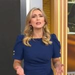 Kelly O’Grady’s dark blue puff-sleeve dress on CBS Mornings