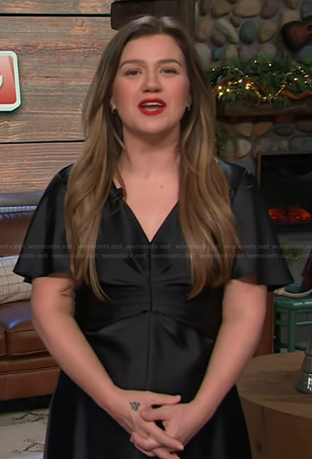 Kelly’s black v-neck satin dress on The Kelly Clarkson Show