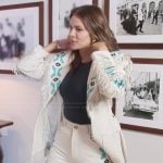 Khloe’s white leather embroidered jacket and pants on The Kardashians