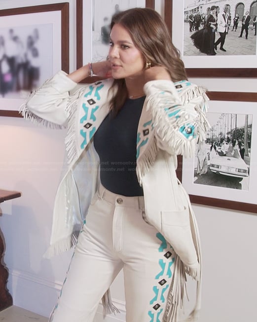 Khloe's white leather embroidered jacket and pants on The Kardashians