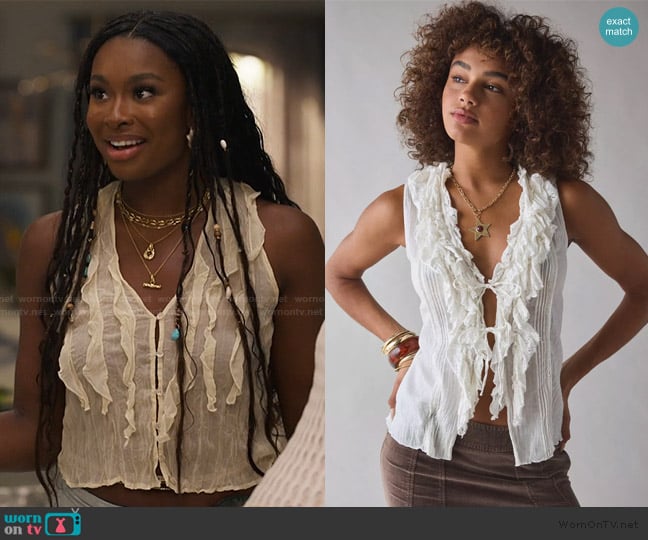 Hilary’s white ruffle front top on Bel-Air Hilary’s white ruffle front top on Bel-Air