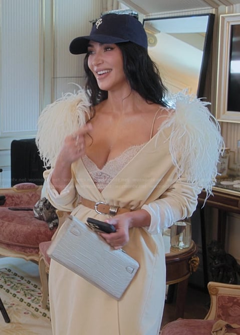 Kim’s feather trim robe on The Kardashians