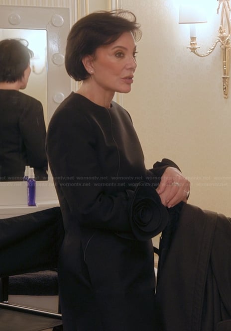 Kris’s black floral sleeve top on The Kardashians