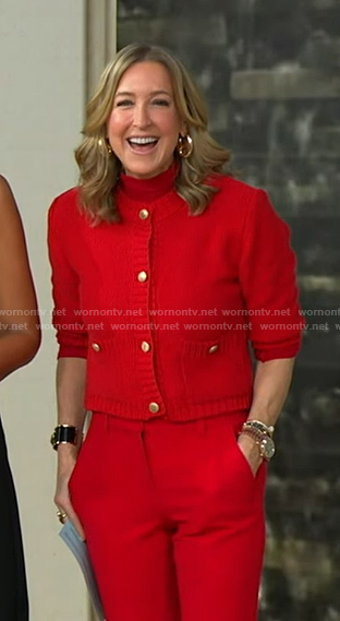 Lara’s red knit cardigan nad front slit pants on Good Morning America