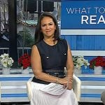 Laura’s navy vest and white pleated skirt on Today