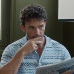 Laurent’s blue chevron pattern shirt on Emily in Paris